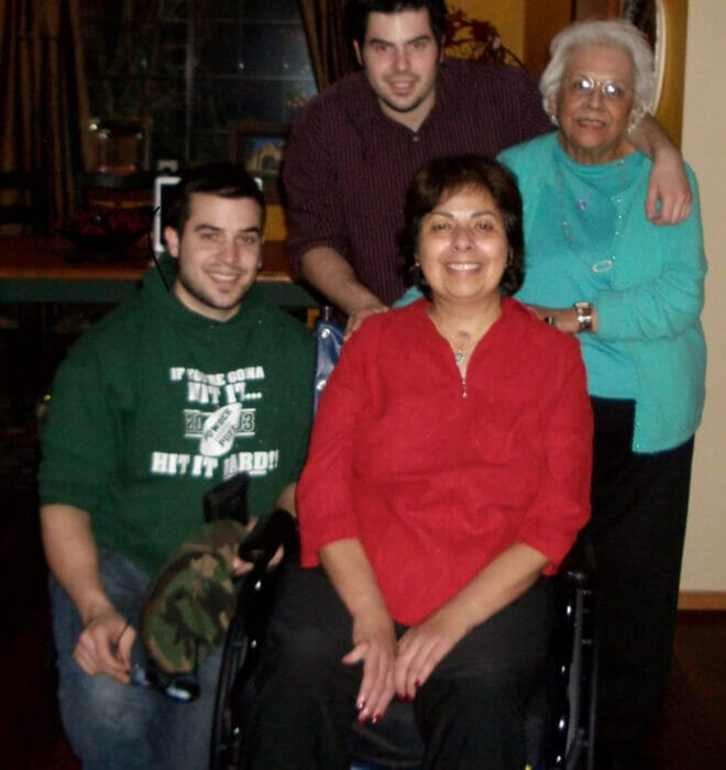 Mari with her sons and her mother.
