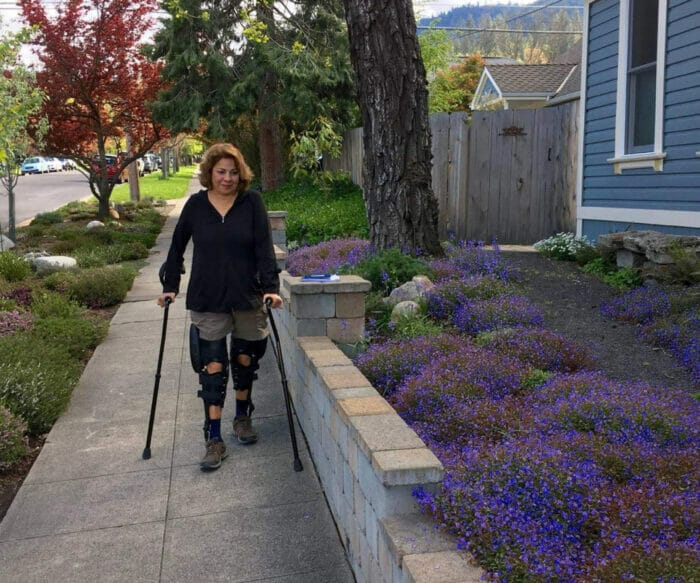 With the help of her braces and canes Mari typically walks three or four days a week, 2-3 miles each time.